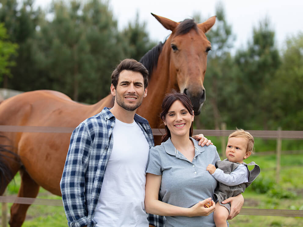 Young family and their horse.